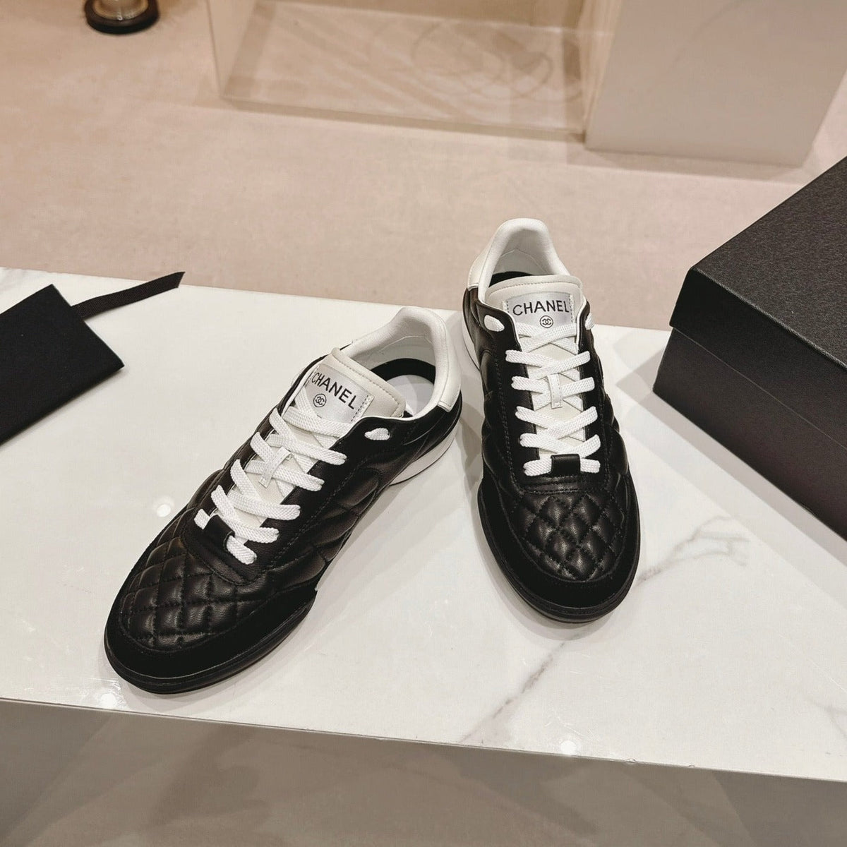 Chanel Sneakers in Glossy Black Lambskin