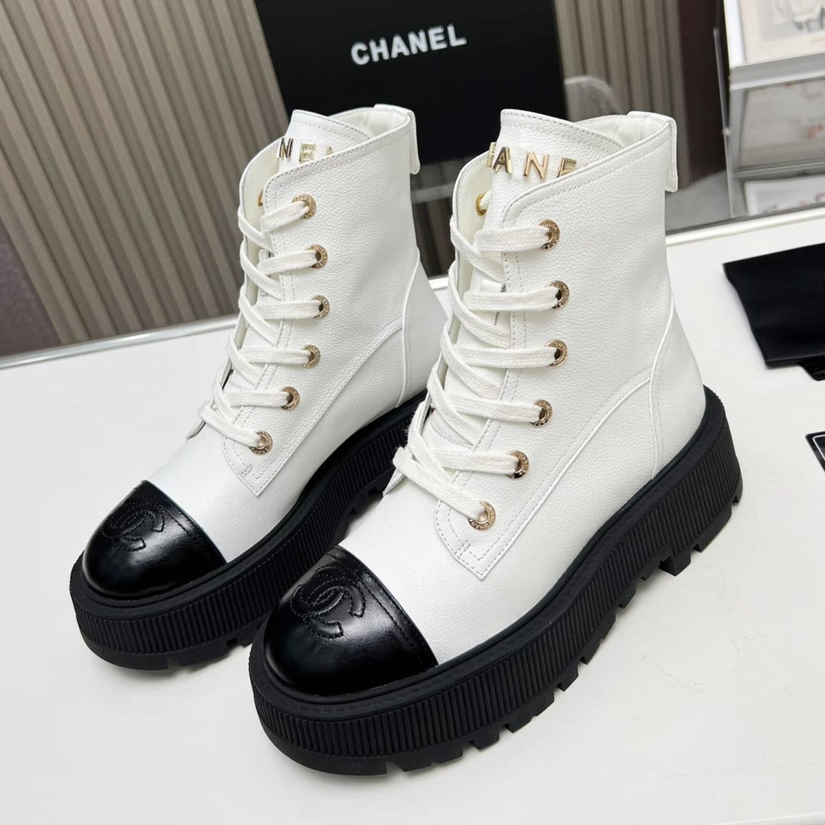Chanel Short Boots in White Mix Black Cowhide
