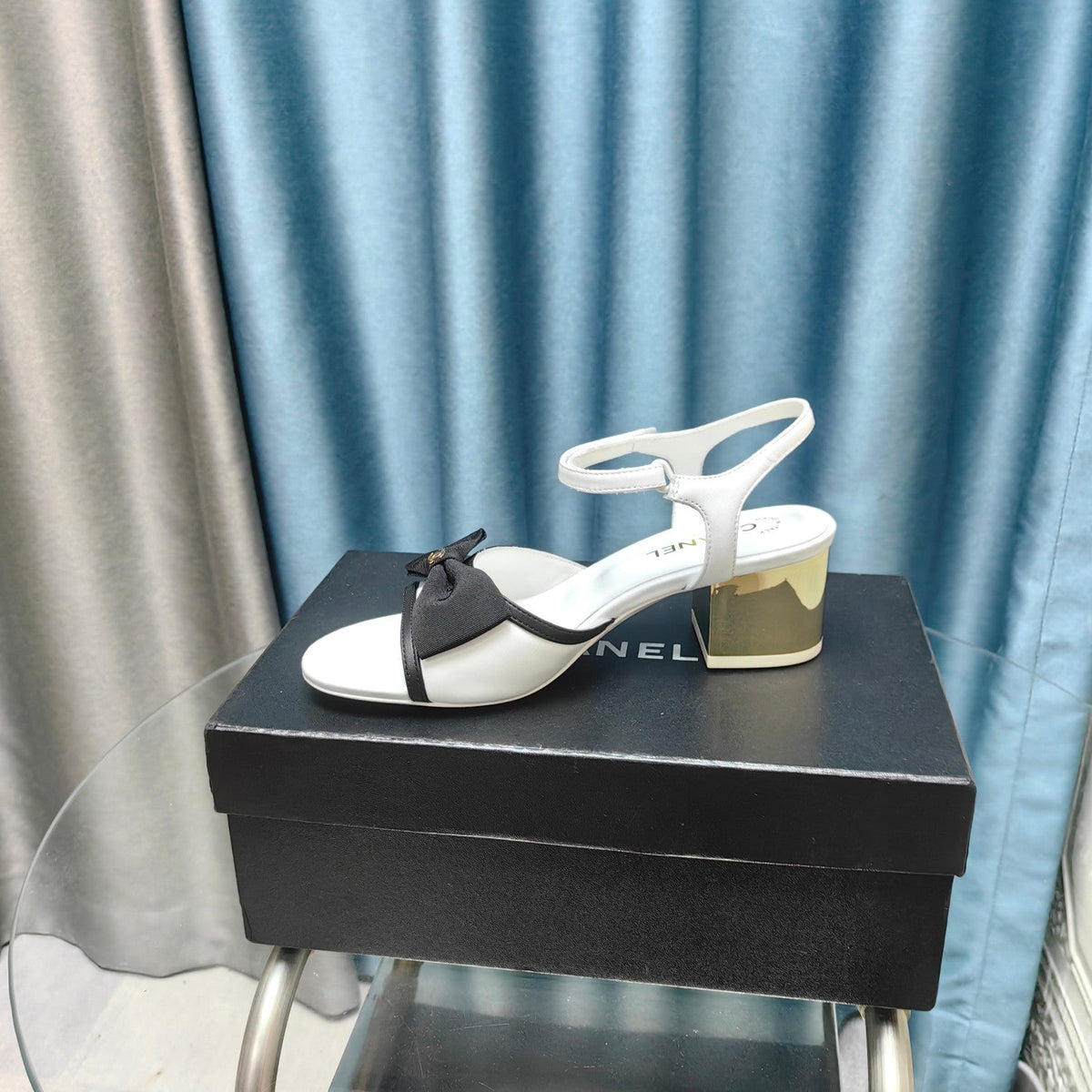 Chanel Sandals in White Sheepskin with Black Satin Bow