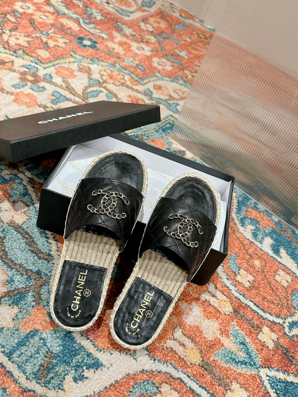 Chanel Flat Slippers in Black Lambskin and Woven with Logo