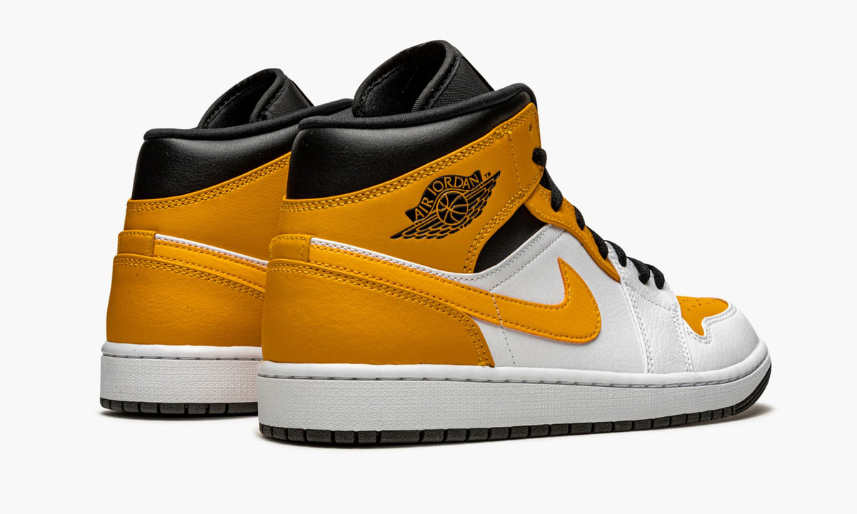 Jordan 1 Mid University Gold Sneakers