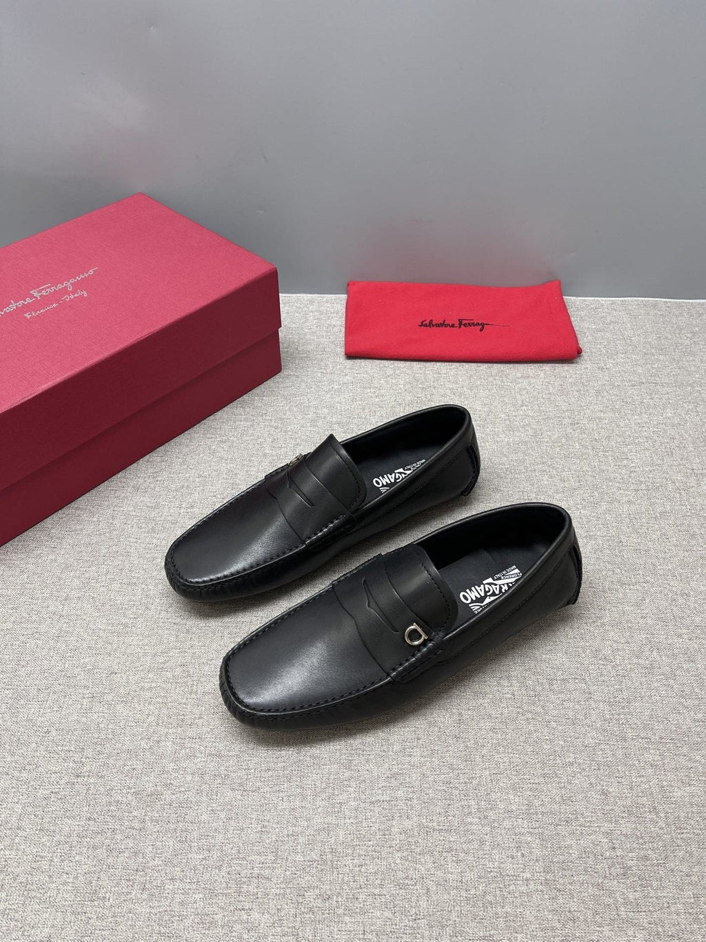 Ferragamo Black Buckle Loafers — front
