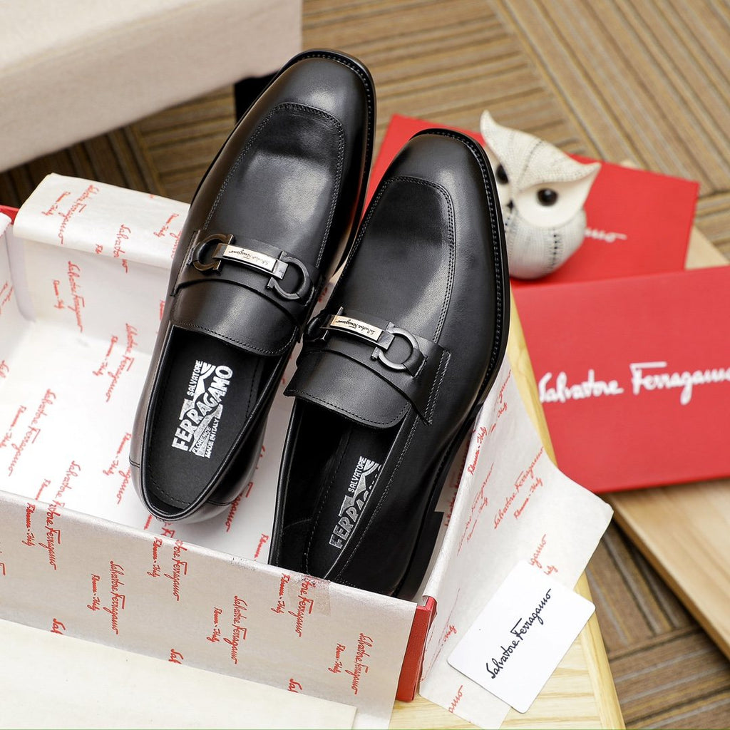 Ferragamo Black Metal Bit Loafers — front
