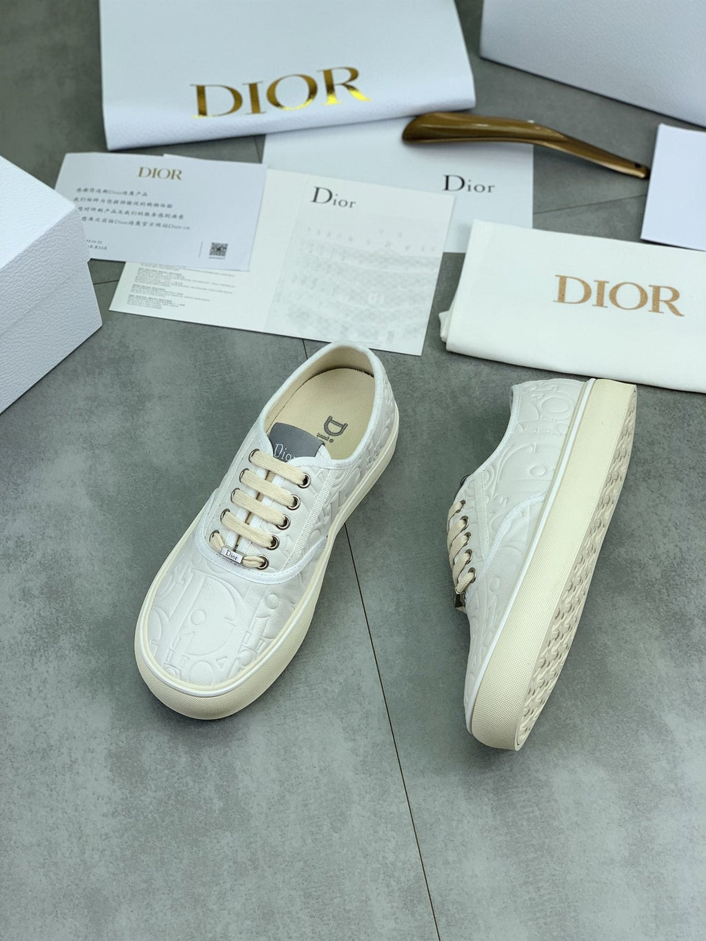 Dior White Embossed Low-Top Sneakers — front
