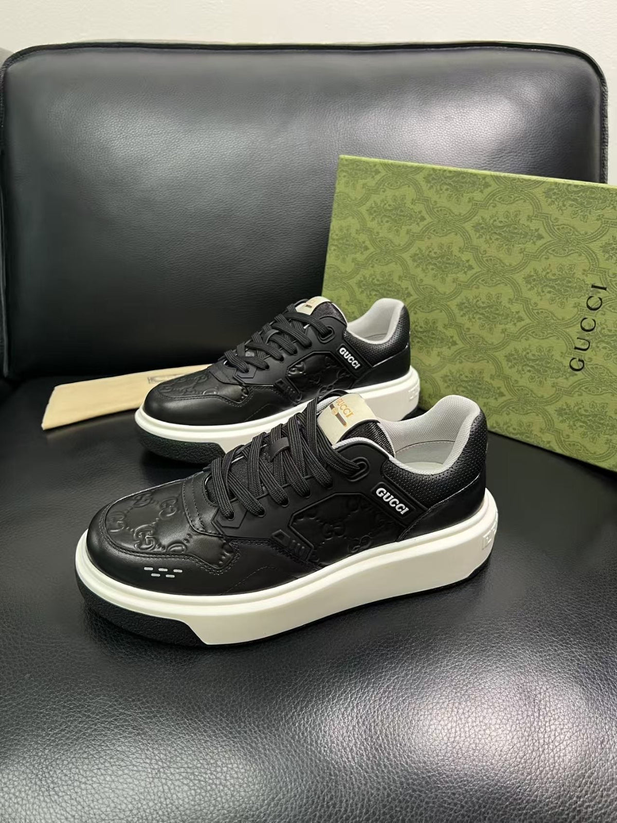 Gucci Embossed Low-Top Sneakers — front